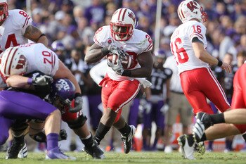 PASADENA, CA - JANUARY 01:  Running back Montee Ball #28 of the Wisconsin Badgers rushes with the ball against the TCU Horned Frogs in the first quarter of the 97th Rose Bowl game on January 1, 2011 in Pasadena, California.  (Photo by Jeff Gross/Getty Ima