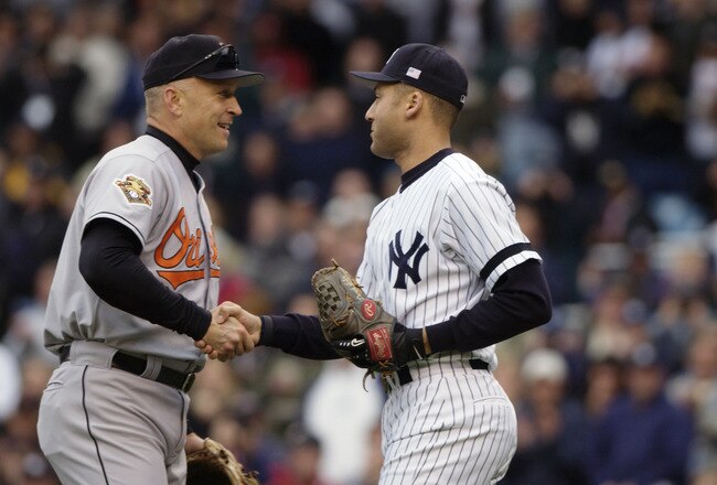 29 Sep 2001: Cal Ripken Jr. of the Baltimore Orioles shakes hands with Derek Jeter of the New York Yankees before  the game at Yankee Stadium in the Bronx, New York. DIGITAL IMAGE. Mandatory Credit: Ezra Shaw/Allsport