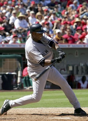 ANAHEIM, CA - AUGUST 27:  Bernie Williams #51 of the New York Yankees hits a two RBI double in the seventh inning against the Los Angeles Angels of Anaheim at Angel Stadium August 27, 2006 in Anaheim, California. The Yankees defeated the Angels 11 to 8.