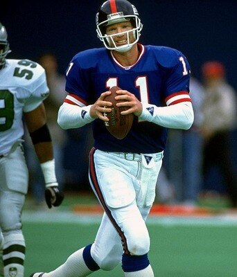 Phil Simms spent his first few years with the Giants struggling with injuries and inconsistent play. But in 1984 with the help of head coach Bill Parcels and offensive coordinator Erhardt, Simms emerged as the offensive leader for the Giants and eventually leading them to two Super Bowl victories