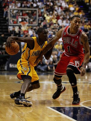 INDIANAPOLIS, IN - APRIL 23: Darren Collison #2 of the Indiana Pacers moves against Derrick Rose #1 of the Chicago Bulls in Game Four of the Eastern Conference Quarterfinals in the 2011 NBA Playoffs at Conseco Fieldhouse on April 23, 2011 in Indianapolis,
