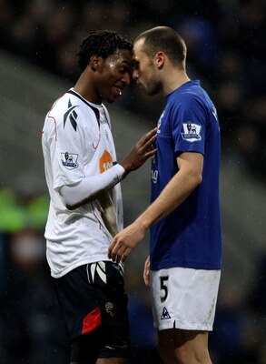 BOLTON, ENGLAND - FEBRUARY 13:  Daniel Sturridge of Bolton Wanderers and John Heitinga of Everton square up during the Barclays Premier League match between Bolton Wanderers and Everton at the Reebok Stadium on February 13, 2011 in Bolton, England.  (Phot