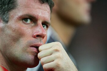 KUALA LUMPUR, MALAYSIA - JULY 16: Jamie Carragher of Liverpool watches from the touchline during the pre-season friendly match between Malaysia and Liverpool at the Bukit Jalil National Stadium on July 16, 2011 in Kuala Lumpur, Malaysia. (Photo by Stanley