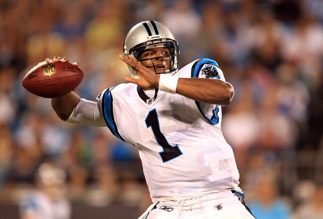 CHARLOTTE, NC - AUGUST 13:  Cam Newton #1 of the Carolina Panthers drops back to throw a pass during their preseason game against the New York Giants at Bank of America Stadium on August 13, 2011 in Charlotte, North Carolina.  (Photo by Streeter Lecka/Get