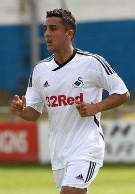 PORT TALBOT, WALES - JULY 16:  Neil Taylor of Swansea City looks on during the pre season friendly match between Port Talbot and Swansea City on July 16, 2011 in Port Talbot, Wales.  (Photo by David Rogers/Getty Images)