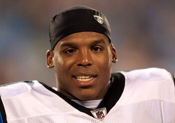 CHARLOTTE, NC - AUGUST 13:  Cam Newton #1 of the Carolina Panthers watches on during their preseason game against the New York Giants at Bank of America Stadium on August 13, 2011 in Charlotte, North Carolina.  (Photo by Streeter Lecka/Getty Images)