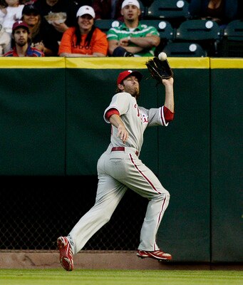 HOUSTON - APRIL 09:  Right fielder Jayson Werth #28 of the Philadelphia Phillies makes a catch on a fly ball by Houston Astros' Jeff Keppinger in the first inning at Minute Maid Park on April 9, 2010 in Houston, Texas.  (Photo by Bob Levey/Getty Images)