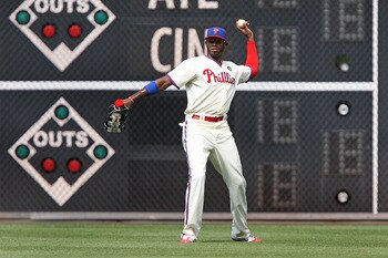 PHILADELPHIA - JULY 24: Right fielder Domonic Brown #9 of the Philadelphia Phillies throws to second base during a game against the San Diego Padres at Citizens Bank Park on July 24, 2011 in Philadelphia, Pennsylvania. The Phillies won 5-3. (Photo by Hunt