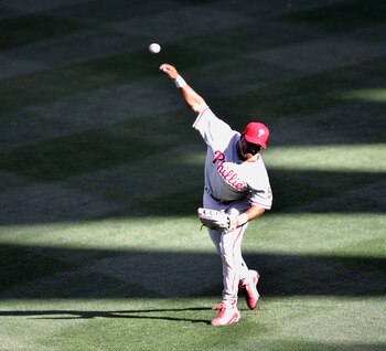 ST. LOUIS - APRIL 8:  Bobby Abreu #53 of the Philadelphia Phillies fields a ball hit by Yadier Molina #41 of the St. Louis Cardinals at Busch Stadium on April 8, 2005 in St. Louis, Missouri. The Cards defeated the Phillies 6-5. (Photo by Dilip Vishwanat/G