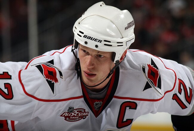 NEWARK, NJ - FEBRUARY 16:  Eric Staal #12 of the Carolina Hurricanes skates against the New Jersey Devils at the Prudential Center on February 16, 2011 in Newark, New Jersey.  (Photo by Bruce Bennett/Getty Images)