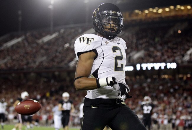 PALO ALTO, CA - SEPTEMBER 18:  Chris Givens #2 of the Wake Forest Demon Deacons runs in for a touchdown against the Stanford Cardinal at Stanford Stadium on September 18, 2010 in Palo Alto, California.  (Photo by Ezra Shaw/Getty Images)