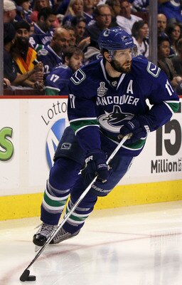 VANCOUVER, BC - JUNE 04:  Ryan Kesler #17 of the Vancouver Canucks skates with the puck against the Boston Bruins during Game Two of the 2011 NHL Stanley Cup Final at Rogers Arena on June 4, 2011 in Vancouver, British Columbia, Canada.  (Photo by Bruce Be