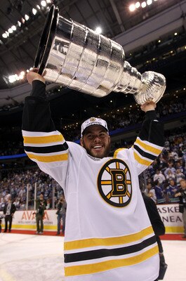 VANCOUVER, BC - JUNE 15:  Nathan Horton #18 of the Boston Bruins celebrates with the Stanley Cup after defeating the Vancouver Canucks in Game Seven of the 2011 NHL Stanley Cup Final at Rogers Arena on June 15, 2011 in Vancouver, British Columbia, Canada.