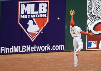 SAN FRANCISCO - OCTOBER 20:  Ben Francisco #10 of the Philadelphia Phillies misses a catch giving Buster Posey #28 of the San Francisco Giants a double in Game Four of the NLCS during the 2010 MLB Playoffs at AT&T Park on October 20, 2010 in San Francisco