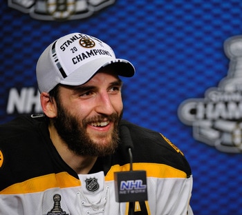 VANCOUVER, BC - JUNE 15:  Patrice Bergeron #37 of the Boston Bruins talks to the media after defeating the Vancouver Canucks in Game Seven of the 2011 NHL Stanley Cup Final at Rogers Arena on June 15, 2011 in Vancouver, British Columbia, Canada. The Bosto