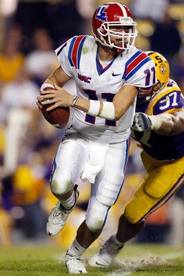 BATON ROUGE, LA - NOVEMBER 14:  Quarterback Ross Jenkins #11 of the Louisiana Tech Bulldogs looks to throw the ball against the LSU Tigers at Tiger Stadium on November 14, 2009 in Baton Rouge, Louisiana.  The Tigers defeated the Bulldogs 24-16.  (Photo by