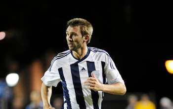 SANTA CLARA, CA - JULY 12: Gareth McAuley #23 of West Bromwich Albion of the English Premier League runs up field against the San Jose Earthquakes during a friendly soccer game at Buck Shaw Stadium on July 12, 2011 in Santa Clara, California. The Earthqua