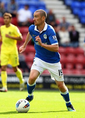 WIGAN, ENGLAND - AUGUST 07:  David Jones of Wigan Athletic in action during the pre season friendly match between Wigan Athletic and Villarreal at DW Stadium on August 7, 2011 in Wigan, England.  (Photo by Clive Brunskill/Getty Images)
