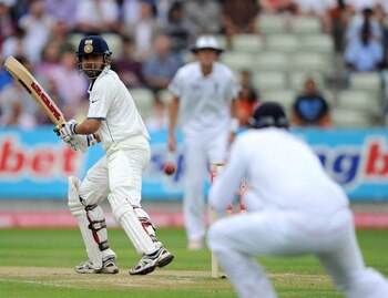BIRMINGHAM, ENGLAND - AUGUST 13:  Gautam Gambhir of India is caught out at slip by Graeme Swann of England during day four of the 3rd npower test between England and India at Edgbaston on August 13, 2011 in Birmingham, England.  (Photo by Gareth Copley/Ge