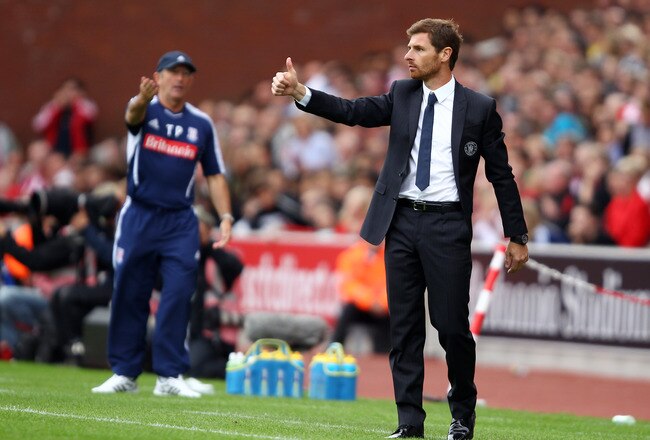 STOKE ON TRENT, ENGLAND - AUGUST 14:  (R-L) Opposing managers Andre Villas-Boas of Chelsea and Tony Pulis of Stoke gesture from the sidelines during the Barclays Premier League match between Stoke City and Chelsea at the Britannia Stadium on August 14, 20
