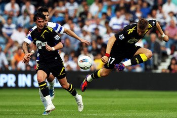 Chris Eagles, left, and Ivan Klasnic, right, of Bolton Wanderers participated in the demolition of QPR at Loftus Road
