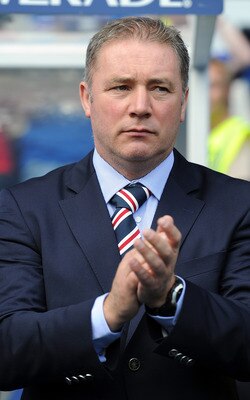 GLASGOW, SCOTLAND - JULY 23: Rangers manager Ally McCoist applauds as the Championship Flag is raised prior to the Clydesdale Bank Premier League match between Rangers and Hearts at Ibrox Stadium on July 23, 2011 in Glasgow, Scotland.  (Photo by Chris Bru
