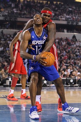 ARLINGTON, TX - FEBRUARY 14:  Dwight Howard #12 of the Eastern Conference smiles  while playing against Zach Randolph #50 of the Western Conference during the first half of the NBA All-Star Game, part of 2010 NBA All-Star Weekend at Cowboys Stadium on Feb