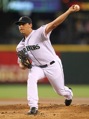SEATTLE - JULY 31:  Starting pitcher Jason Vargas #38 of the Seattle Mariners pitches against the Tampa Bay Rays at Safeco Field on July 31, 2011 in Seattle, Washington. The Rays defeated the Mariners 8-1.(Photo by Otto Greule Jr/Getty Images)