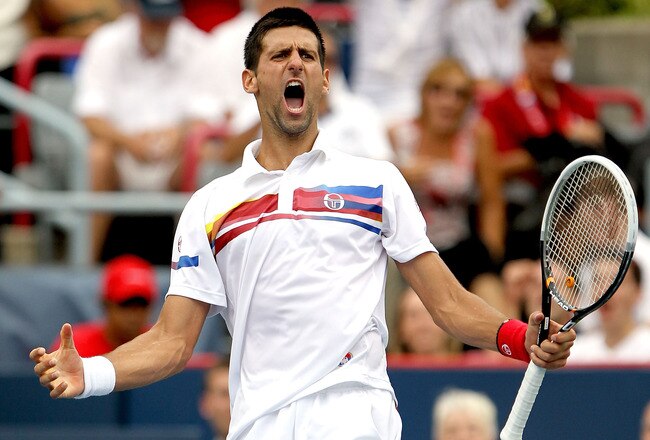 MONTREAL, QC - AUGUST 14:  Novak Djokovic of Serbia celebrates match point against Mardy Fish of the United States in the final of the Rogers Cup at Uniprix Stadium on August 14, 2011 in Montreal, Quebec, Canada.  (Photo by Matthew Stockman/Getty Images)
