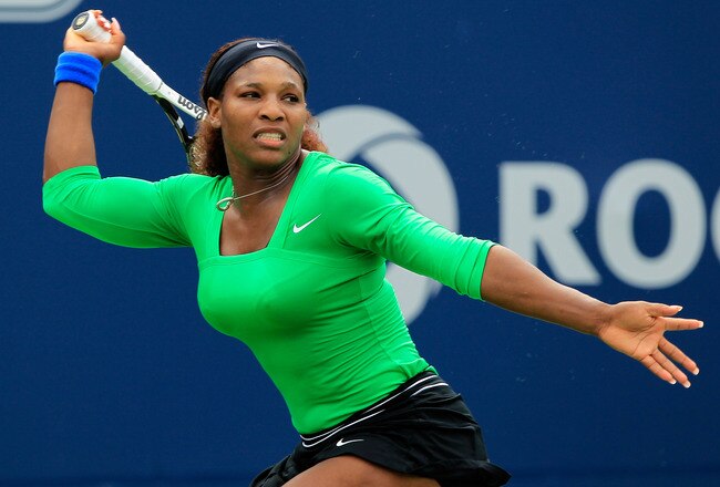 TORONTO, CANADA - AUGUST 14:  Serena Williams returns a shot to Samantha Stosur of Australia on Day 7 in the final of the Rogers Cup presented by National Bank at the Rexall Centre on August 14, 2011 in Toronto, Ontario, Canada.  (Photo by Chris Trotman/G