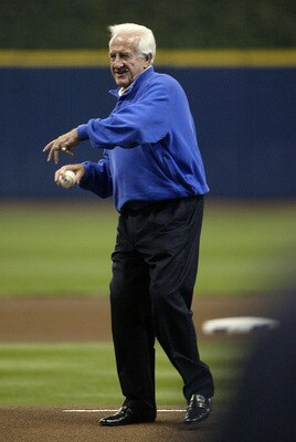 MILWAUKEE - OCTOBER 04:  Former major league baseball player Bob Uecker throws out the ceremonial first pitch prior to the Milwaukee Brewers playing against the Philadelphia Phillies in Game three of the NLDS during the 2008 MLB playoffs at Miller Park on