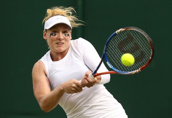 LONDON, ENGLAND - JUNE 22:   Bethanie Mattek-Sands of the United States returns a shot during her first round match against  Misaki Doi of Japan on Day Three of the Wimbledon Lawn Tennis Championships at the All England Lawn Tennis and Croquet Club on Jun