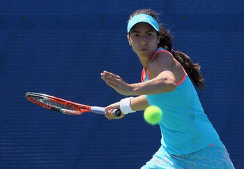 CARLSBAD, CA - AUGUST 04:  Christina McHale returns a forehand to Agnieszka Radwanska of Poland during the Mercury Insurance Open presented by Tri-City Medical at the La Costa Resort and Spa on August 4, 2011 in Carlsbad, California.  (Photo by Jeff Gross