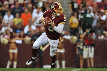 LANDOVER, MD - AUGUST 12:  Rex Grossman #8 of the Washington Redskins looks to pass against the Pittsburgh Steelers  at FedExField on August 12, 2011 in Landover, Maryland. The Redskins defeated the Steelers 16-7. (Photo by Larry French/Getty Images)