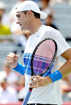 MONTREAL, QC - AUGUST 10: John Isner of the United States celebrates match point against Marcos Baghdatis of Cyprus during the Rogers Cup at Uniprix Stadium on August 10, 2011 in Montreal, Canada.  (Photo by Matthew Stockman/Getty Images)