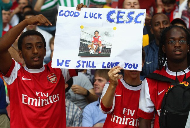LONDON, ENGLAND - AUGUST 16:  Arsenal fans show their support for former captain Cesc Fabregas ahead of the UEFA Champions League play-off first leg match between Arsenal and Udinese at the Emirates Stadium on August 16, 2011 in London, England.  (Photo b