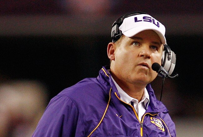 ARLINGTON, TX - JANUARY 07:  Head coach Les Miles of the Louisiana State University Tigers watches the score board during a timeout against the Texas A&M Aggies during the AT&T Cotton Bowl at Cowboys Stadium on January 7, 2011 in Arlington, Texas.  (Photo