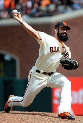 SAN FRANCISCO, CA - AUGUST 7: Brian Wilson #38 of the San Francisco Giants pitches against the Philadelphia Phillies in the ninth inning during an MLB baseball game at AT&T Park August 7, 2011 in San Francisco, California. The Giants won the game 3-1. (Ph