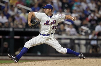 NEW YORK, NY - AUGUST 02:  Chris Capuano #38 of the New York Mets pitches against the Florida Marlins at Citi Field on August 2, 2011 in the Flushing neighborhood of the Queens borough of New York City.  (Photo by Nick Laham/Getty Images)