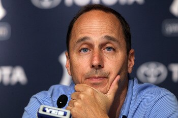 NEW YORK, NY - JULY 08:  General manager Brian Cashman of the New York Yankees speaks to the media after the game against the Tampa Bay Rays was postponed due to rain on July 8, 2011 at Yankee Stadium in the Bronx borough of New York City.  (Photo by Jim