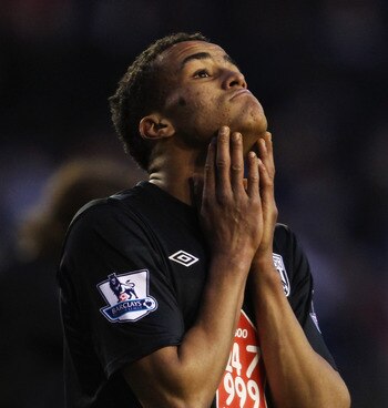 READING, ENGLAND - JANUARY 08: James Hurst of West Bromwich Albion reacts as team mate Jonas Olsson is sent off during the FA Cup sponsored by E.ON 3rd round match between Reading and West Bromwich Albion at Madejski Stadium on January 8, 2011 in Reading,