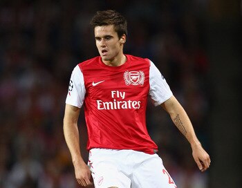 LONDON, ENGLAND - AUGUST 16:  Carl Jenkinson of Arsenal with the ball during the UEFA Champions League play-off first leg match between Arsenal and Udinese at the Emirates Stadium on August 16, 2011 in London, England.  (Photo by Julian Finney/Getty Image