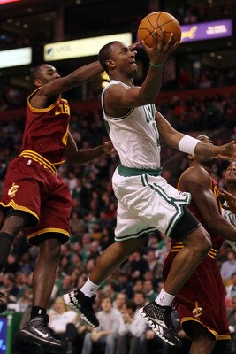 BOSTON, MA - JANUARY 25:  Von Wafer #12 of the Boston Celtics heads for the net as Christian Eyenga #8 of the of the Cleveland Cavaliers defends on January 25, 2011 at the TD Garden in Boston, Massachusetts. The Celtics defeated the Cavaliers 112-95.  NOT