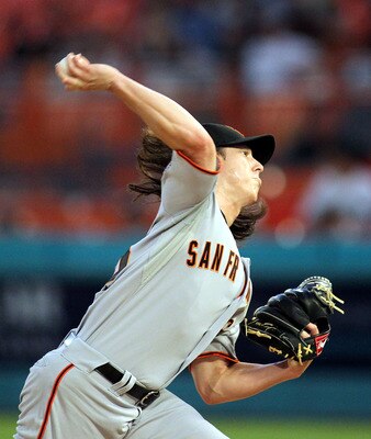 MIAMI GARDENS, FL - AUGUST 13:  Pitcher Tim Lincecum #55 of the San Francisco Giants throws against the Florida Marlins at Sun Life Stadium on August 13, 2011 in Miami Gardens, Florida.  (Photo by Marc Serota/Getty Images)