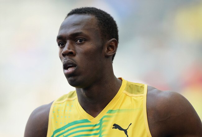 BERLIN - AUGUST 15:  Usain Bolt of Jamaica competes in the men's 100 Metres Heats during day one of the 12th IAAF World Athletics Championships at the Olympic Stadium on August 15, 2009 in Berlin, Germany.  (Photo by Mark Dadswell/Getty Images)
