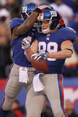 EAST RUTHERFORD, NJ - NOVEMBER 28:  Kevin Boss #89 of the New York Giants celebrates scoring the winning touchdown with team mate Ahmad Bradshaw #44 against the Jacksonville Jaguars at New Meadowlands Stadium on November 28, 2010 in East Rutherford, New J