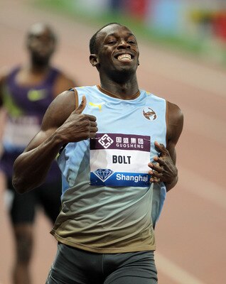 SHANGHAI, CHINA - MAY 23:  Usain Bolt of Jamaica celebrates winning the 200m during the IAAF Diamond League Shanghai at Shanghai Stadium on May 23, 2010 in Shanghai, China.  (Photo by Adam Pretty/Getty Images)