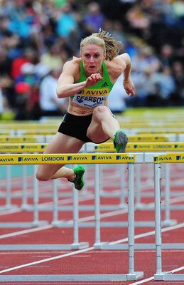 LONDON, ENGLAND - AUGUST 06:  Sally Pearson of Australia competes on her way to winning the Womens 100m Hurdles during the Aviva London Grand Prix at Crystal Palace on August 6, 2011 in London, England.  (Photo by Stu Forster/Getty Images)