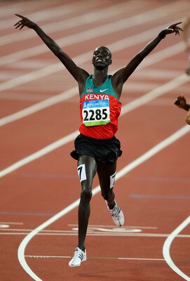 BEIJING - AUGUST 18:  Brimin Kipruto of Kenya celebrates winning the Men's 3000m Steeplechase Final and the gold medal at the National Stadium on Day 10 of the Beijing 2008 Olympic Games on August 18, 2008 in Beijing, China.  (Photo by Phil Walter/Getty I