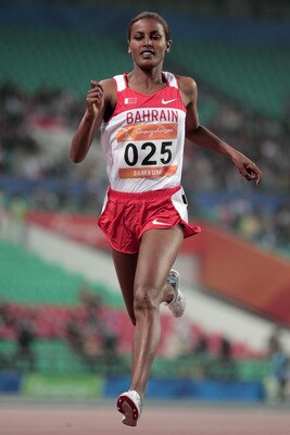 GUANGZHOU, CHINA - NOVEMBER 23:  Maryam Yusuf Isa Jamal of Bahrain competes in the women's 1500m final at Aoti Main Stadium during day eleven of the 16th Asian Games Guangzhou 2010 on November 23, 2010 in Guangzhou, China.  (Photo by Adam Pretty/Getty Ima